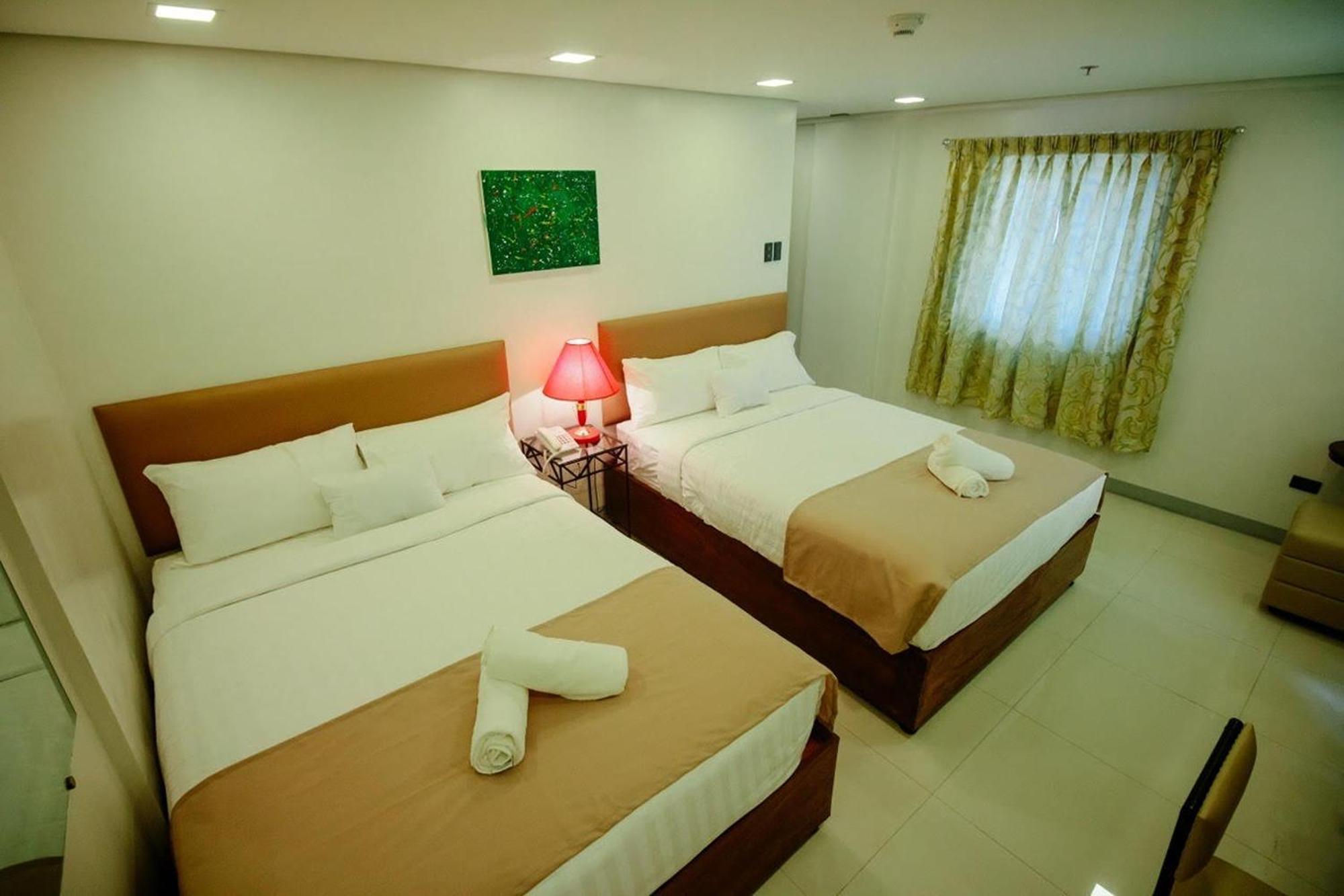 Belltower CSheLi Suites Vigan City Exterior foto