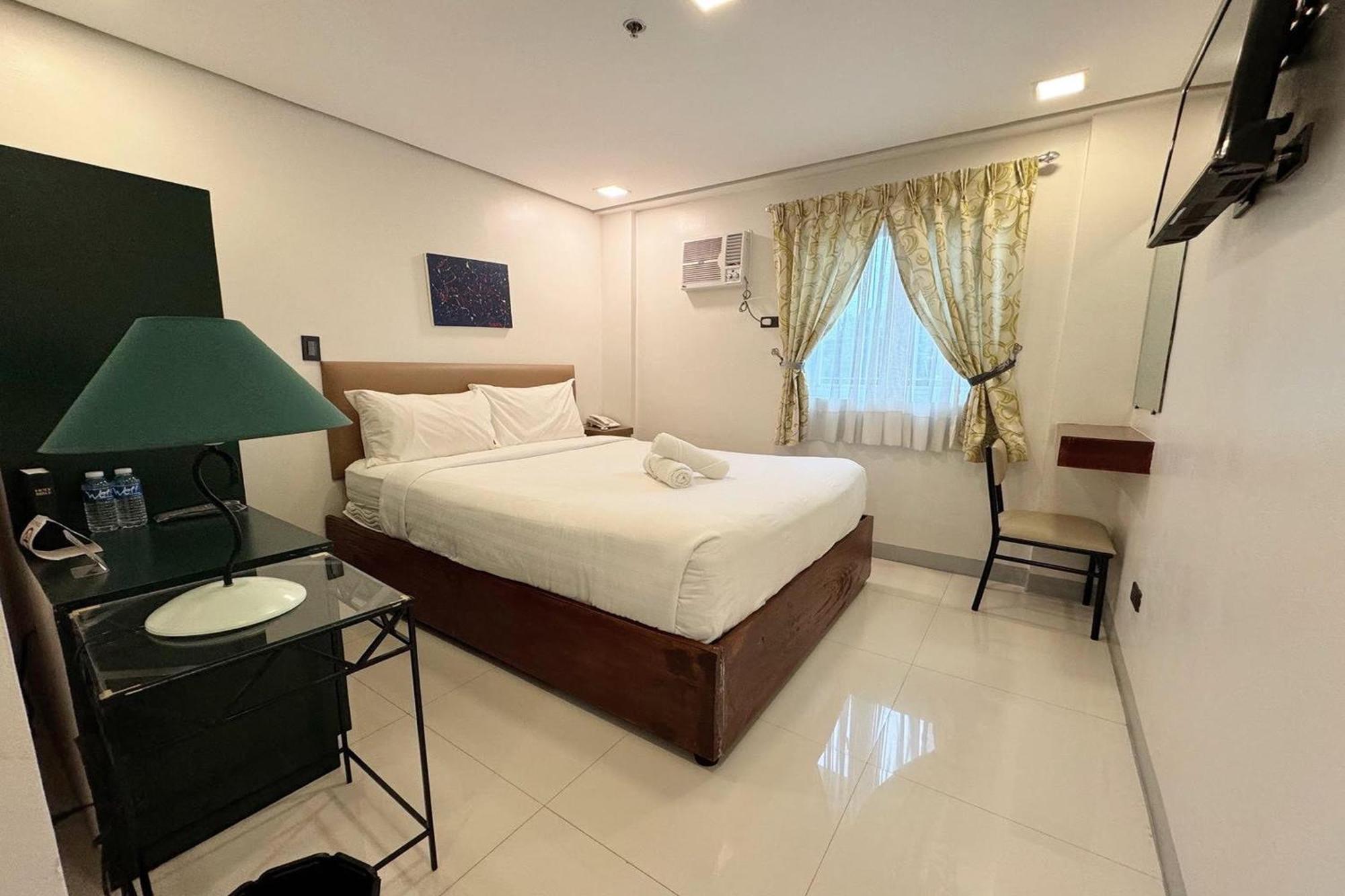Belltower CSheLi Suites Vigan City Exterior foto
