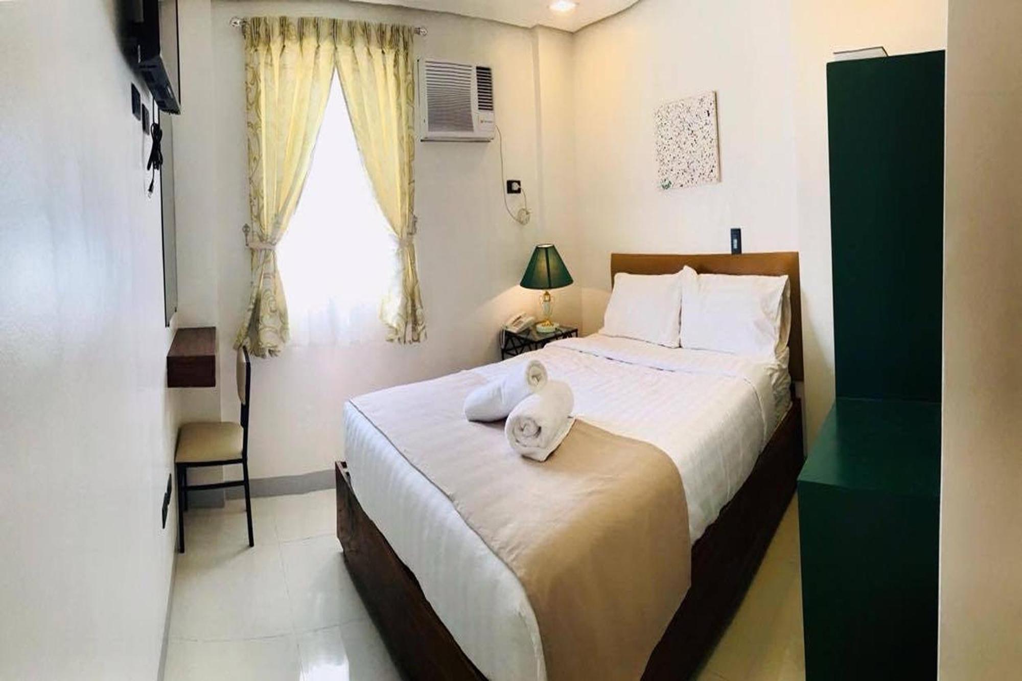 Belltower CSheLi Suites Vigan City Exterior foto
