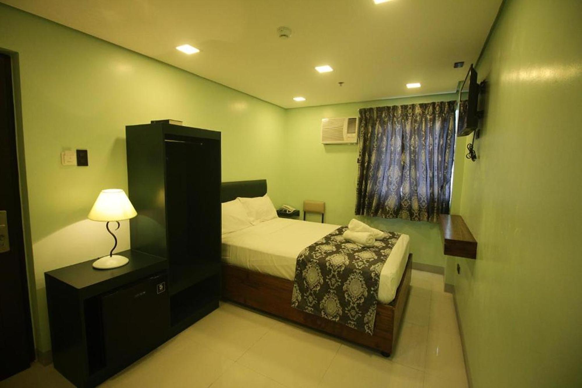 Belltower CSheLi Suites Vigan City Exterior foto